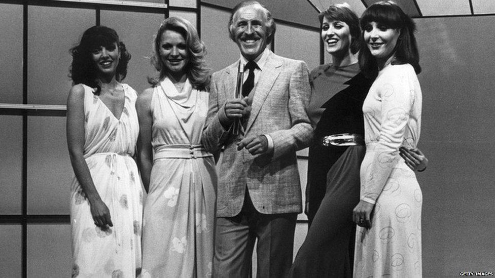 Sir Bruce Forsyth seen here with the four female hostesses, or "Dolly Dealers" of "Play Your Cards Right"; Denny Kemp, Natalie Shaw, Jo Thomas and Yvonne Younger.