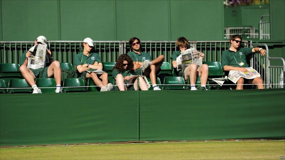 Ground staff relax in the sun