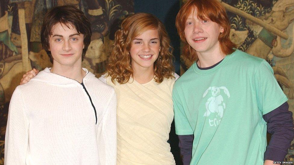 Daniel Radcliffe, Emma Watson and Rupert Grint pose at a photocall ahead of the UK premiere of Harry Potter And The Prisoner Of Azkaban on May 27, 2004 in London