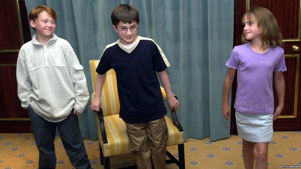 Actors Emma Watson, Rupert Grint and Daniel Radcliffe attend a photocall to present the new cast of the Harry Potter Films on August 23, 2000 in London