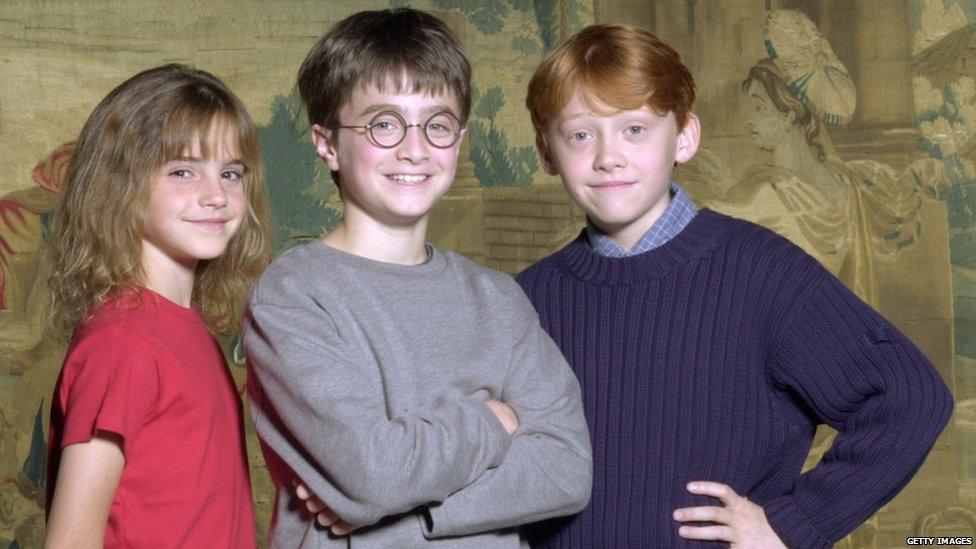 Actors Emma Watson, Rupert Grint and Daniel Radcliffe attend a photocall to present the new cast of the Harry Potter Films on August 23, 2000 in London