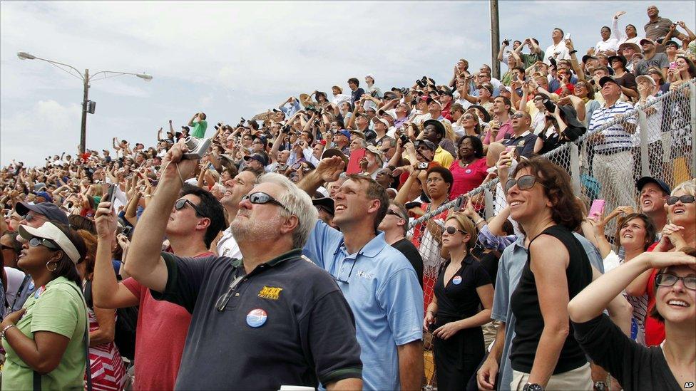 Crowd watching moments of launch