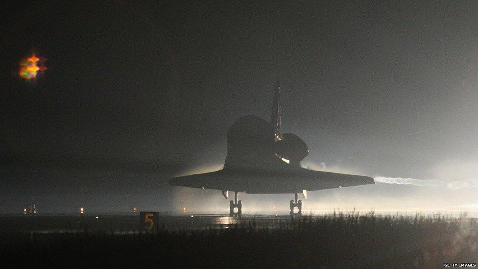 Shuttle Atlantis landing on Earth after its final mission