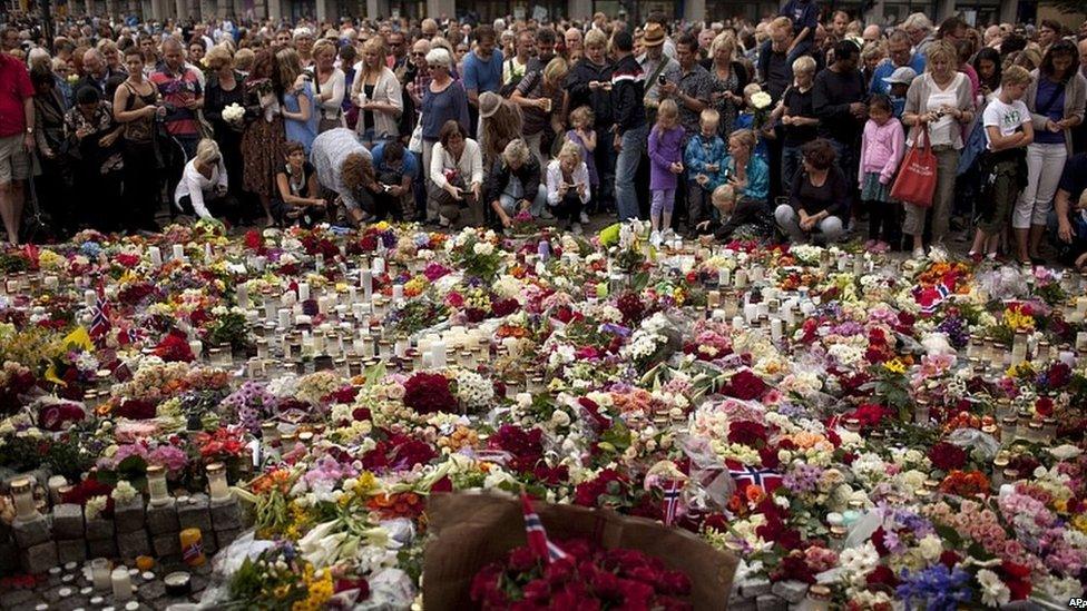 Flowers and candles outside Oslo Cathedral, Sunday, 24 July, 2011