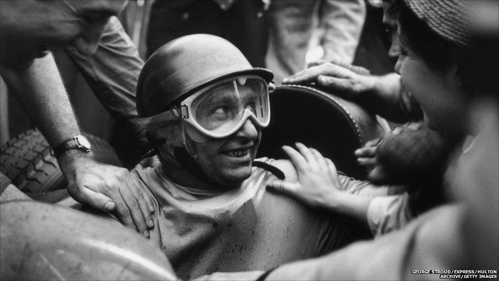 Argentinian racing driver Juan Manuel Fangio (1911 - 1995) wins the British Grand Prix at Silverstone, 14t July 1956