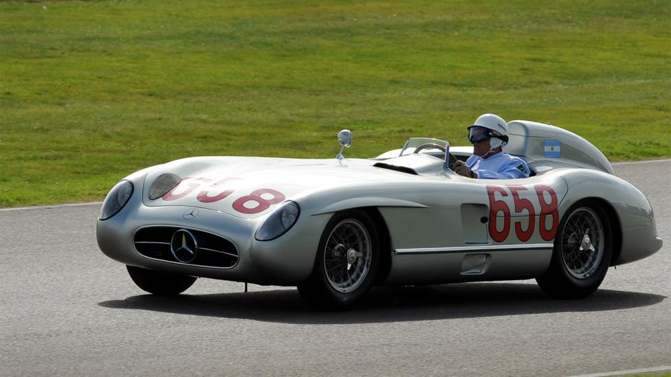 A 1955 Mercedes-Benz 300 SLR on the racing track at Goodwood