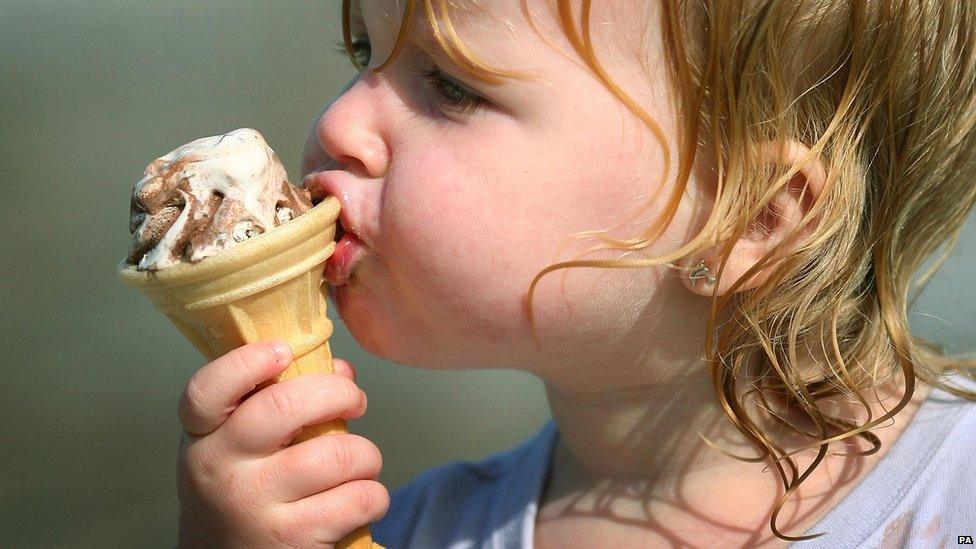 Alyssa enjoying an ice cream in the warm weather