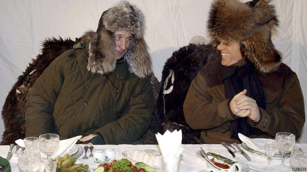 Silvio Berlusconi (right) jokes with Russian President Vladimir Putin at Zavidovo, outside Moscow, 3 February 2003