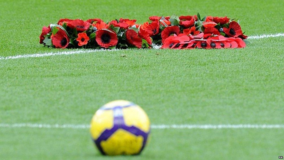 Poppies on football field