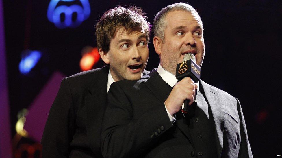 David Tennant leans his head on Chris Moyles' shoulder