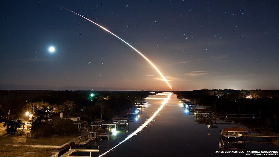 Space shuttle Endeavour launching, taken from 115 miles away.