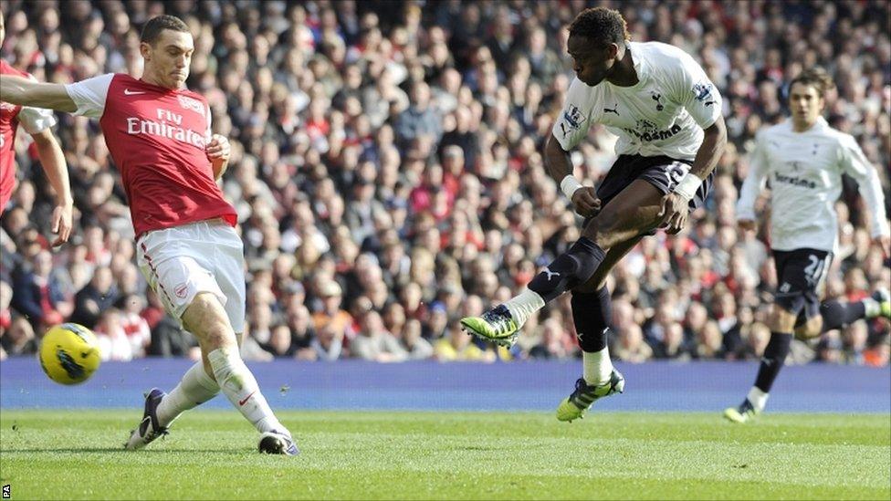 Tottenham Hotspur's Louis Saha (right) scores their first goal against Arsenal at the Emirates Stadium