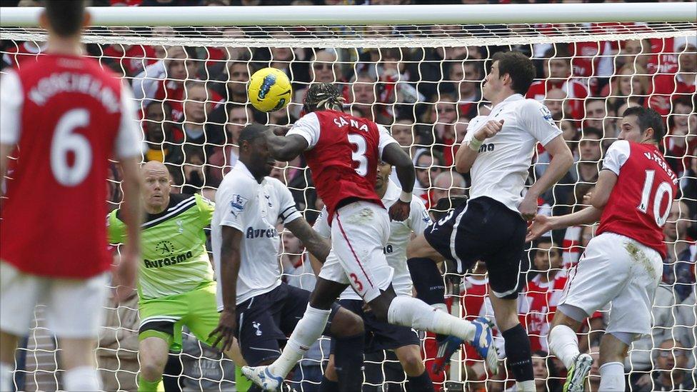 Arsenal's French Bacary Sagna (centre) scores against Tottenham Hotspur