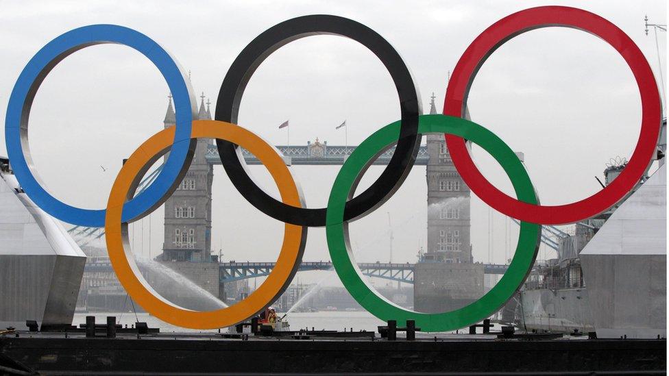 Olympic rings in front of Tower Bridge.