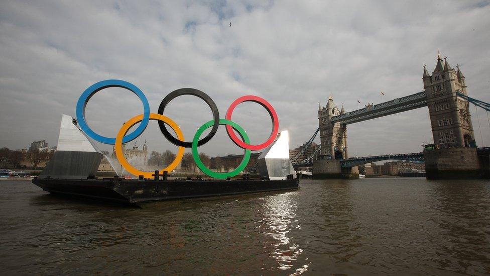 Olympic rings in front of Tower Bridge.