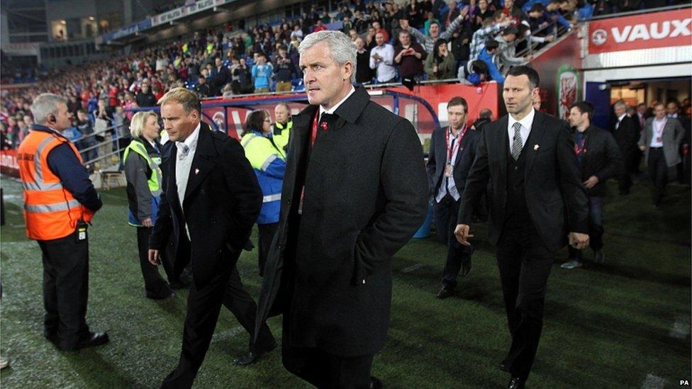 Mark Hughes and Ryan Giggs (right) at half-time during the International Friendly at Cardiff City Stadium, Cardiff. Pic: David Davies/PA Wire