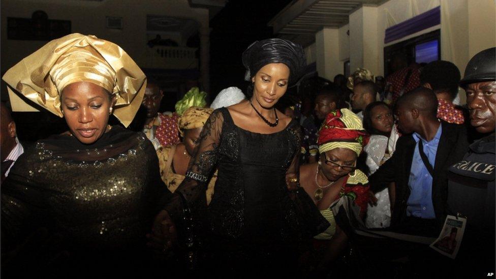 Bianca Ojukwu, centre, widow of Chukwuemeka Ojukwu