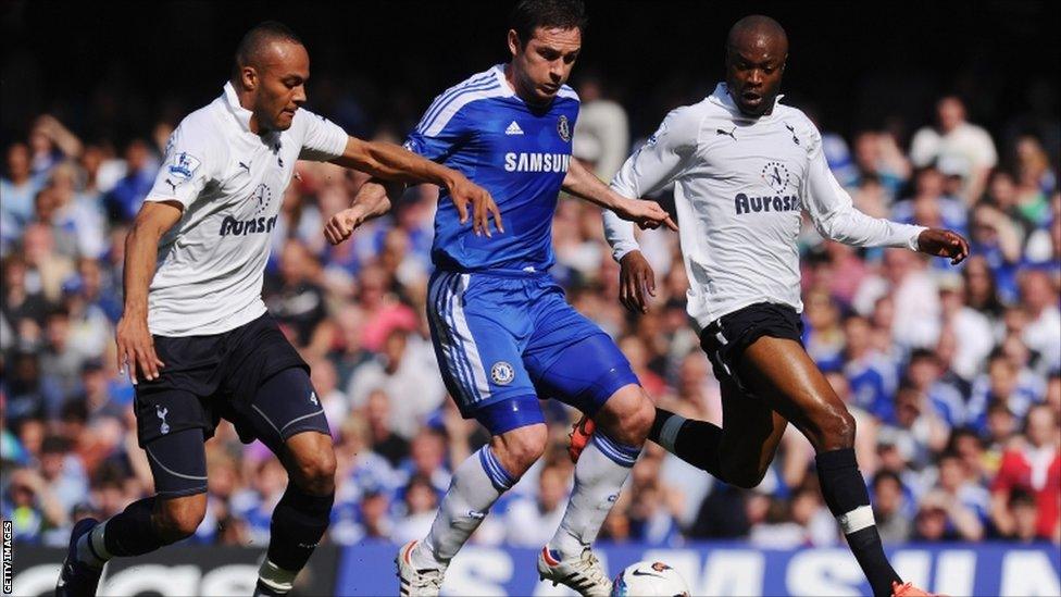 Frank Lampard of Chelsea is closed down by Younes Kaboul (left) and William Gallas of Tottenham Hotspur