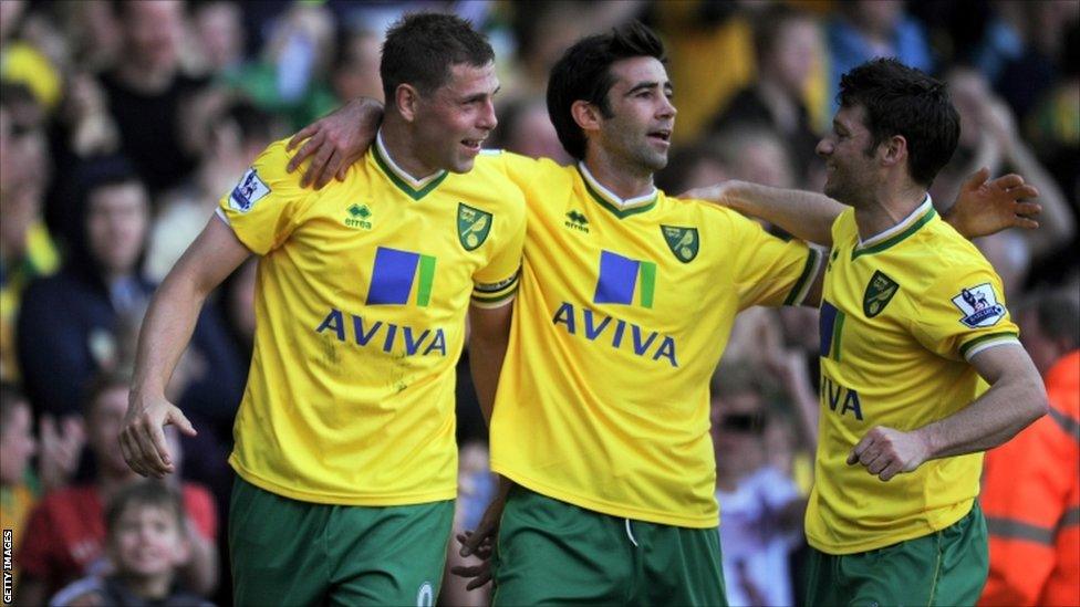 Grant Holt (left) celebrates scoring against Wolves