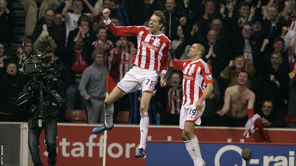 Stoke City's Peter Crouch celebrates scoring their first goal of the game with team-mate Jonathan Walters (right)