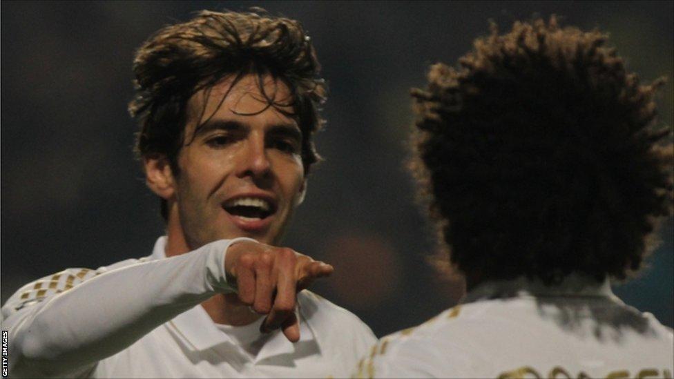 Real Madrid's Brazilian midfielder Kaka celebrates with team mate Real Madrid's Brazilian defender Marcelo after scoring a goal