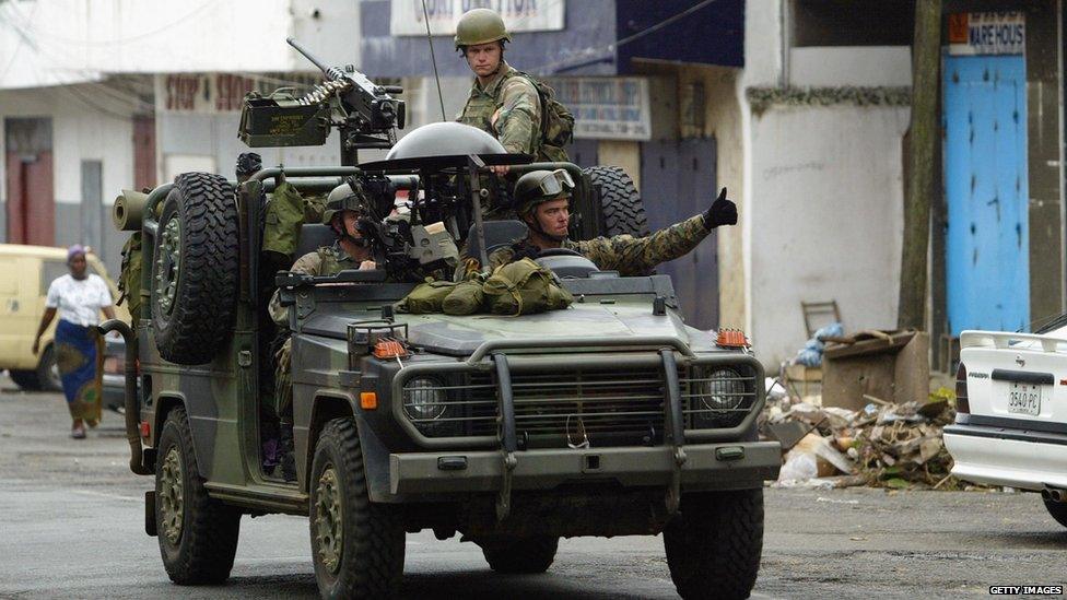 US Marines patrol the streets of Monrovia, 24 August 2003