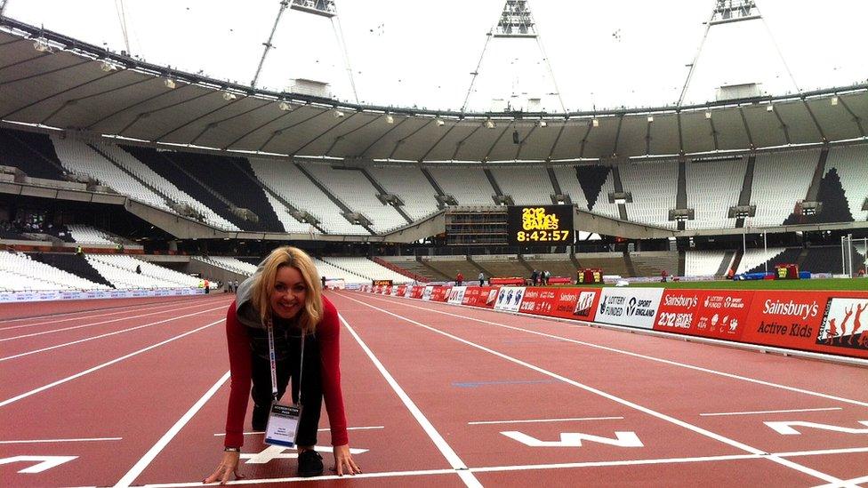 Hayley Cutts crouches on the running track at the new Olympic Stadium in east London