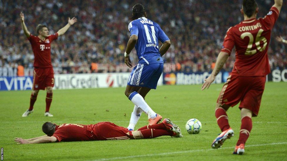 Didier Drogba fouls Franck Ribery