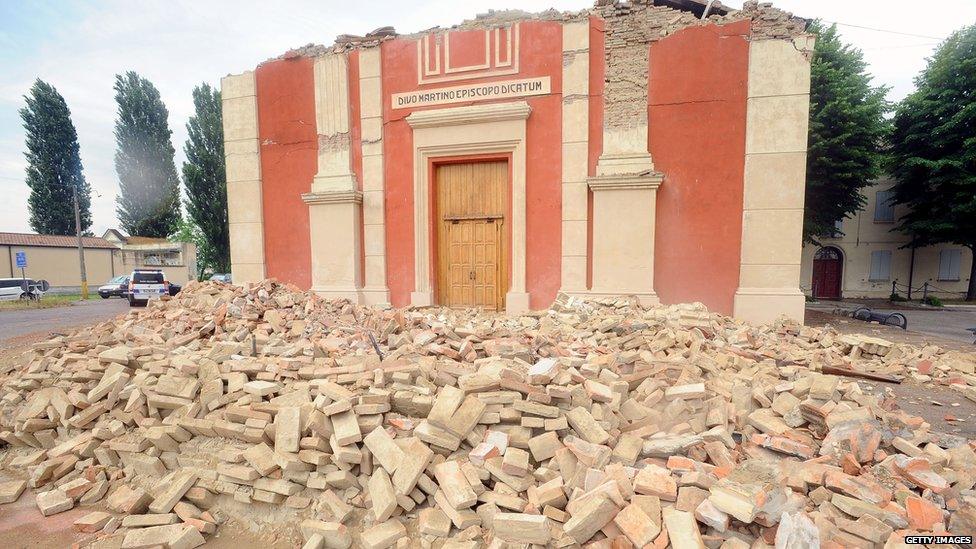 Rubble is strewn in front of the church of Buonacompra following an earthquake.