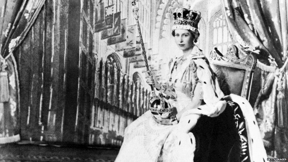 Queen Elizabeth II poses with the royal sceptre 02 June 1953 after being crowned solemnly at Westminter Abbey in London. Elizabeth was proclaimed Queen in 1952 at age 25.