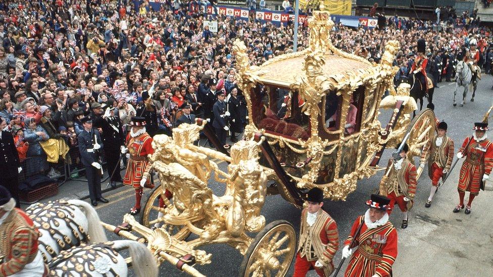 Queen Elizabeth II arrives at St Pauls Cathedral, in the Gold State Coach, for a ceremony marking her Silver Jubilee.