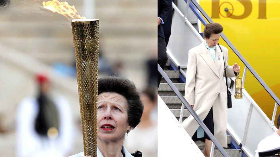 Princess Anne is handed the Olympic flame during the official handover ceremony in Athens
