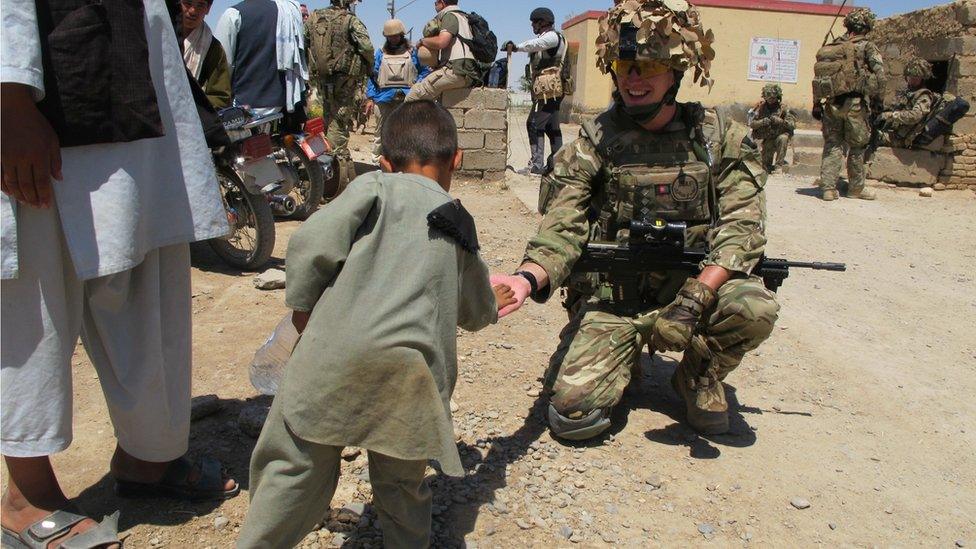 Soldiers fraternising with locals