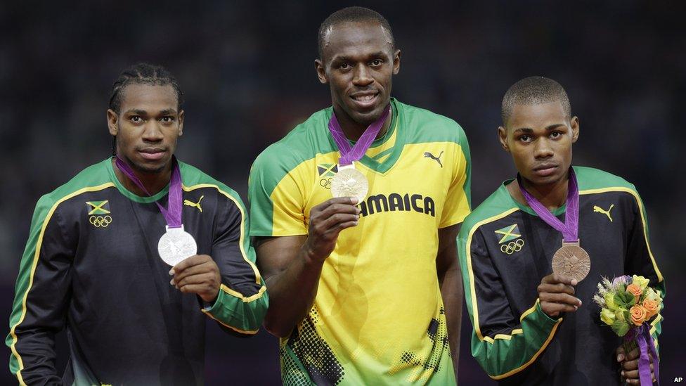 Usain Bolt with Yohan Blake and Warren Weir.