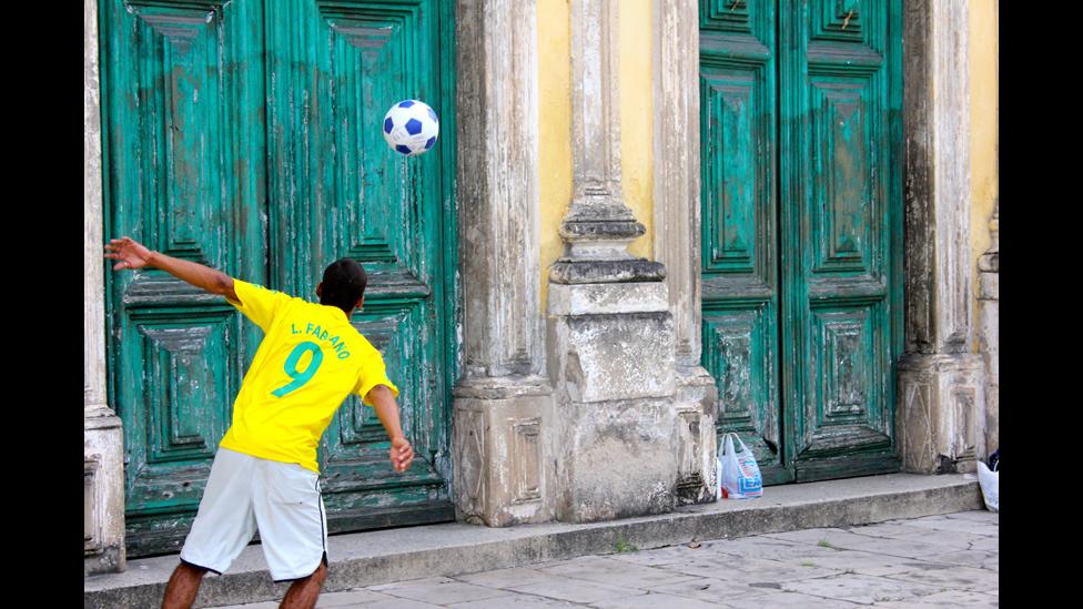 A boy playing football