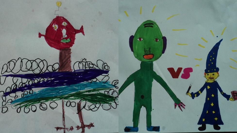 Seven-year-old Joseph has drawn this scary alien and next to it is an alien and wizard by 10-year-old Iris from Sheffield.