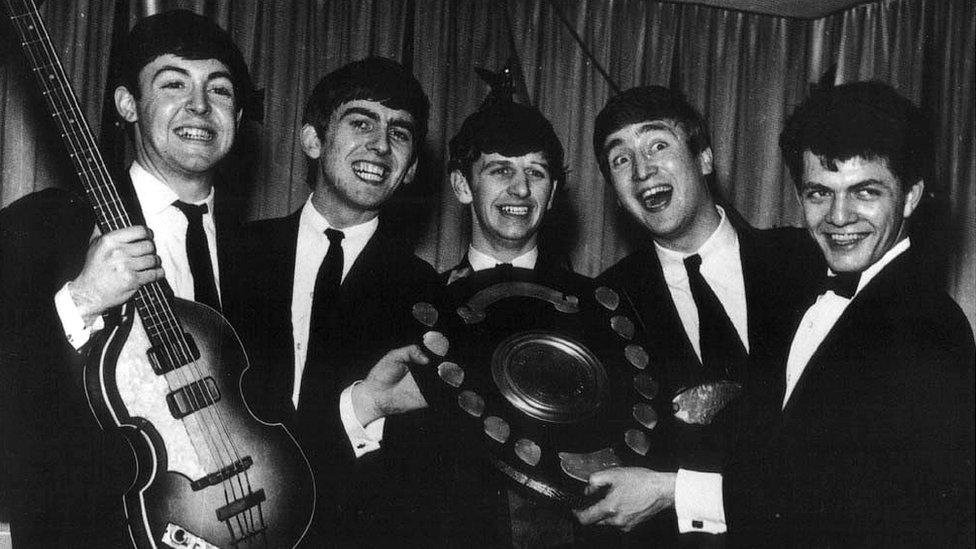 The Beatles with Bill Harry (right)