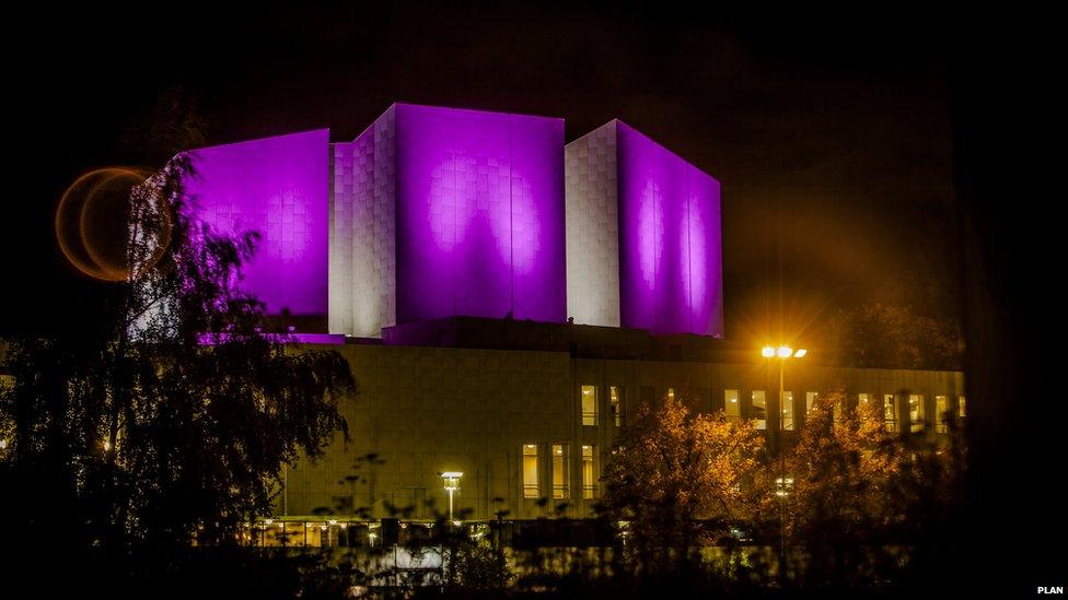 Finlandia Hall in Finland lit up pink