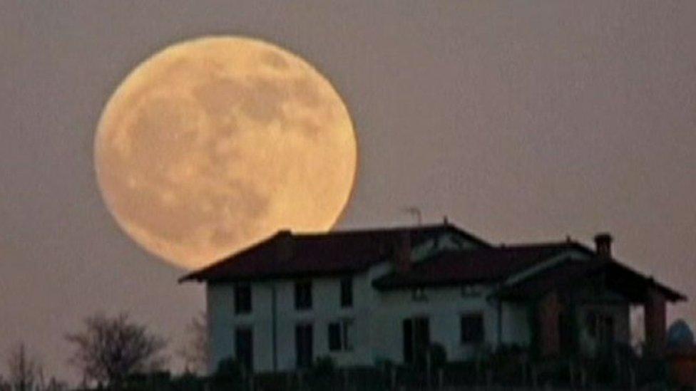 Moon over house