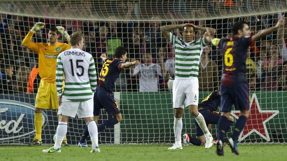 Dismay from the Celtic players as Barcelona's Jordi Alba scores late in the game