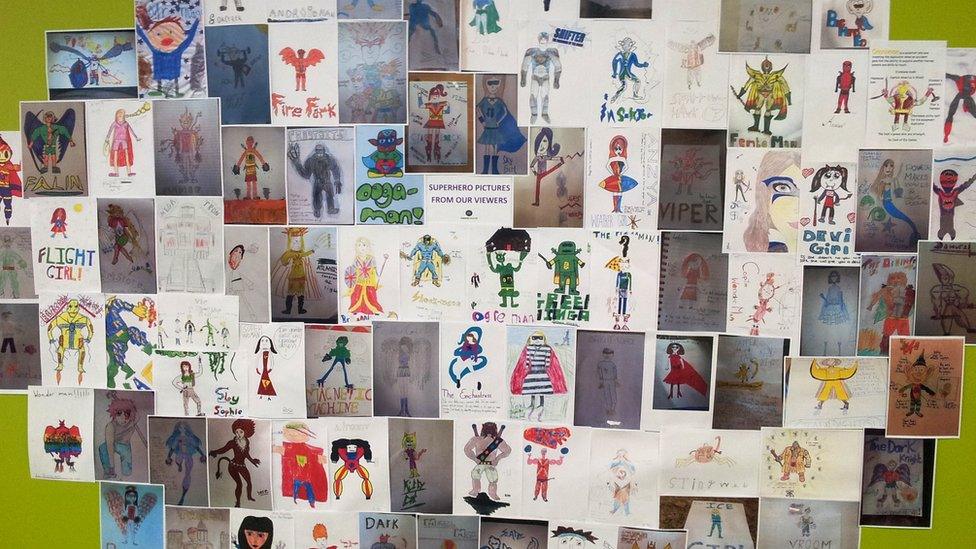 A selection of viewers' drawings on the wall in the Newsround office.