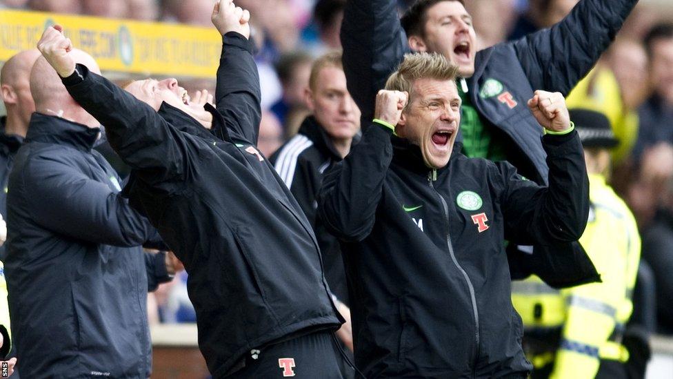 Celtic manager Neil Lennon and assistant Johan Mjallby celebrate as their team clinch the Scottish Premier League title at Rugby Park with a 6-0 win over Kilmarnock