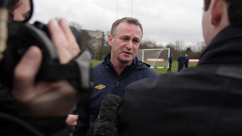 O'Neill answers questions from the media at a Northern Ireland training session before his first game against Norway