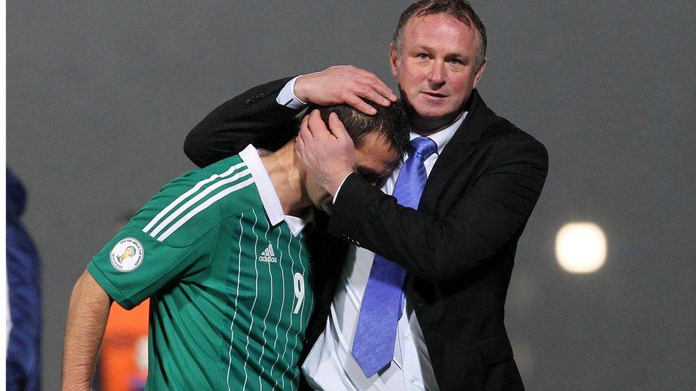 Substitute David Healy scored an injury-time free kick from outside the penalty box to secure a 1-1 draw against Azerbaijan at Windsor Park