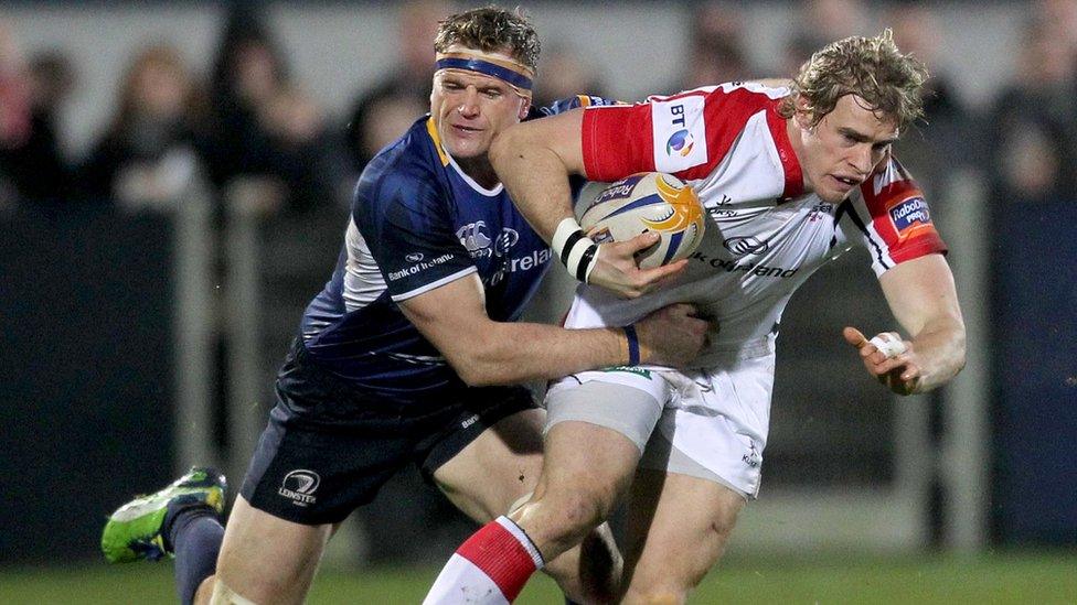 Leinster's Jamie Heaslip tackles Ulster winger Andrew Trimble during the Pro12 match at Ravenhill