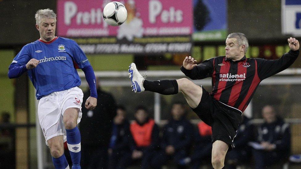 Linfield's William Murphy and Crusaders goalscorer Gary McCutcheon