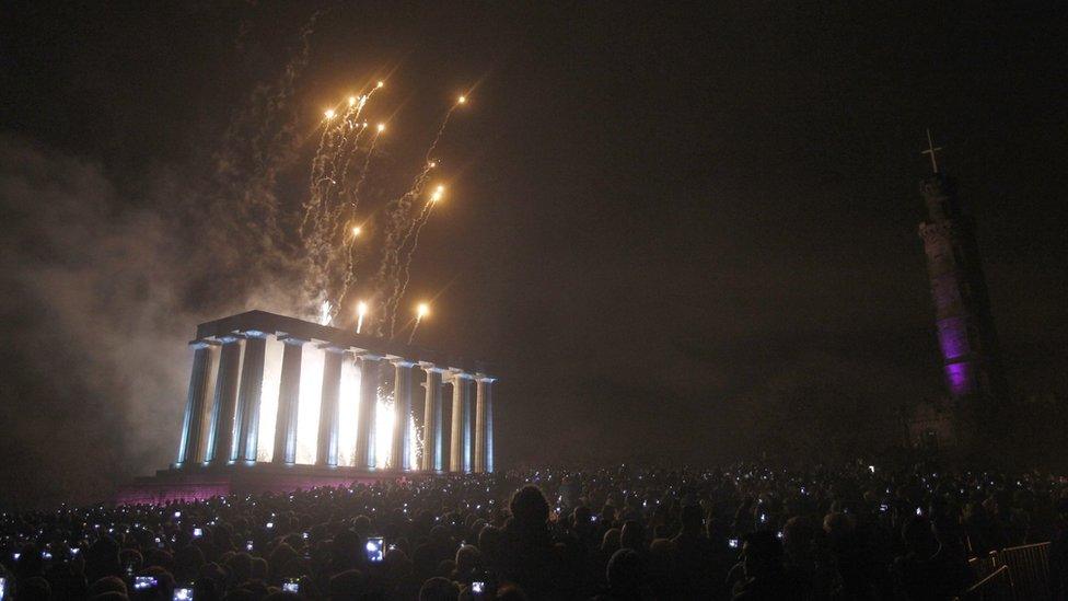 A finale of fireworks after a torchlight procession through Edinburgh as part of the pre Hogmanay celebrations.