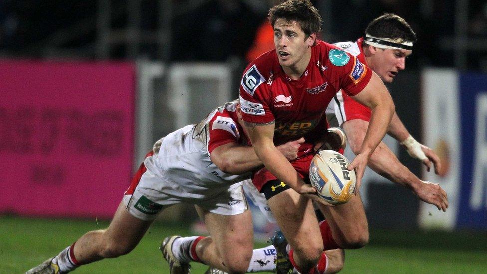 Ulster's Luke Marshall tackles Scarlets fly-half Aled Thomas during the Pro12 clash in Belfast