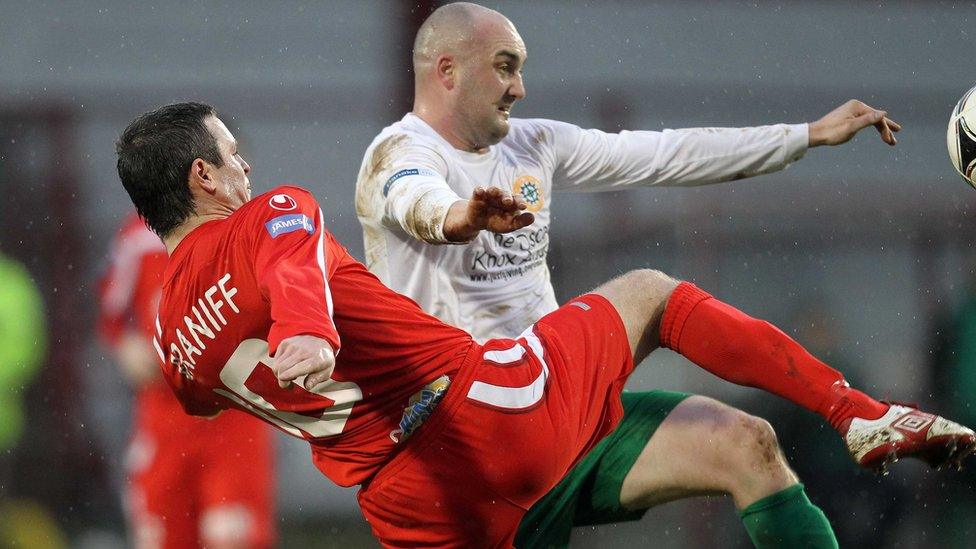 Portadown skipper Kevin Braniff and Paul McAreavey of Donegal Celtic battle for possession