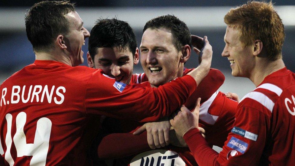 Portadown debutant Gary Twigg is congratulated on scoring the goal which earned a 1-0 win over Donegal Celtic